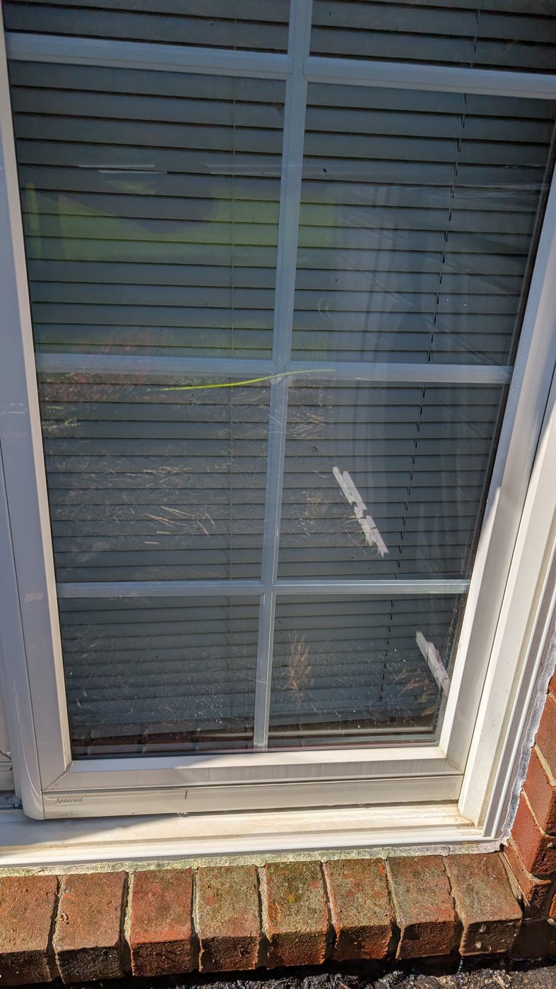 Clean, streak-free window after professional cleaning by Ethan's Window Cleaning near Howell, MI