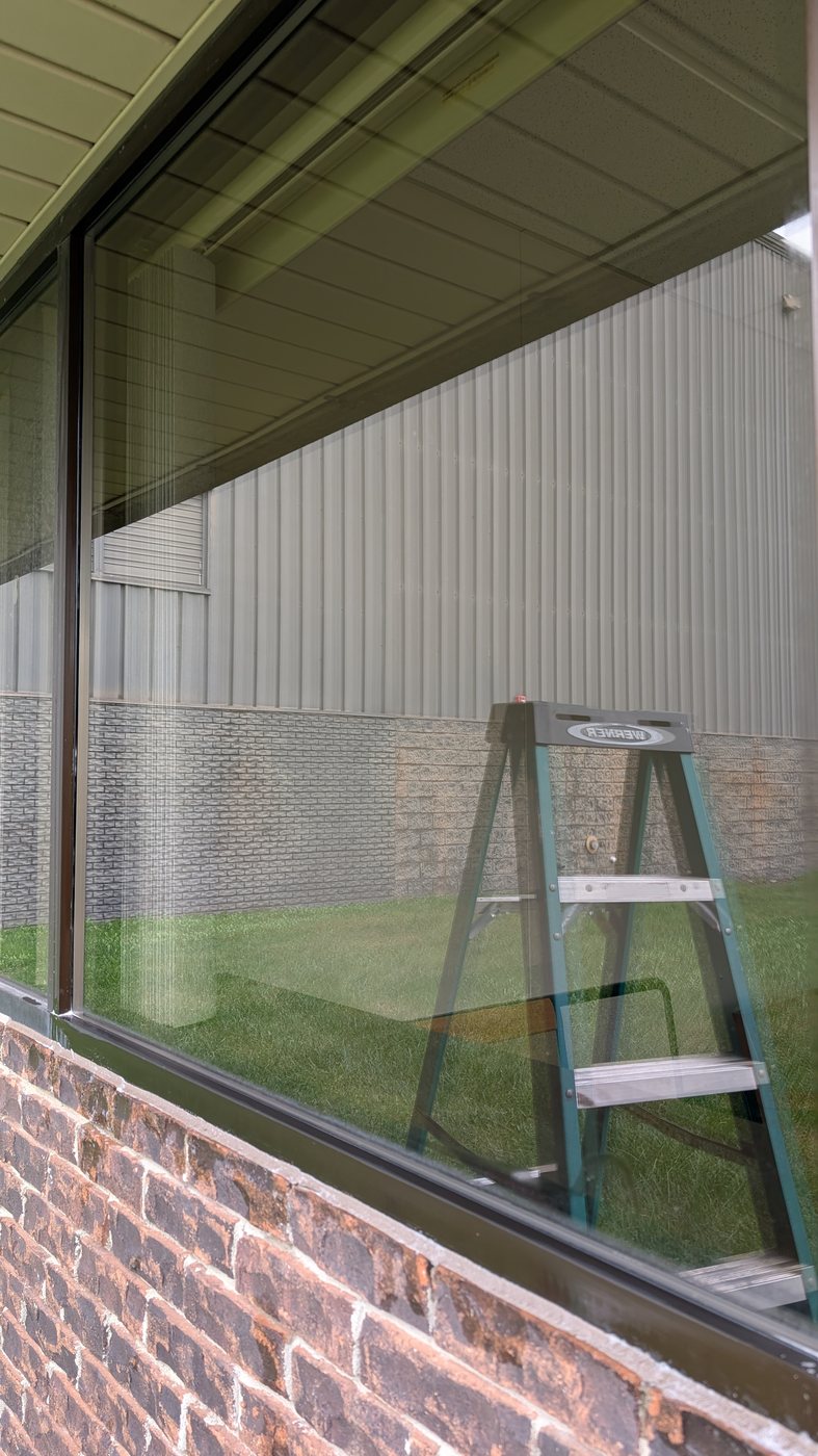 Clean storefront glass after professional commercial window cleaning by Ethan's Window Cleaning